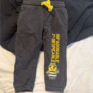 Universal Charcoal Gray Sweatpants with Yellow Minion Graphic